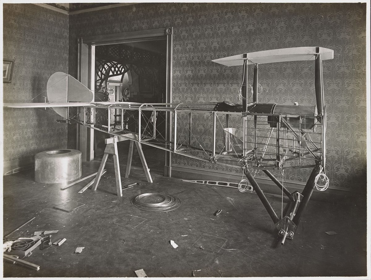 "Basil Watson assembling his aeroplane in his parents' house in St. Kilda Street, Elsternwick" (c. 1917)