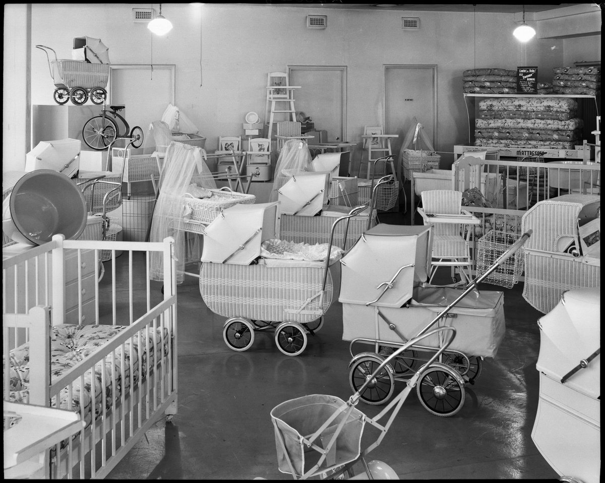 "Interior, showroom, London Baby Carriages shop, 2nd floor, Century Building, 125 Swanston Street, Melbourne", Melbourne City (c. 1951)