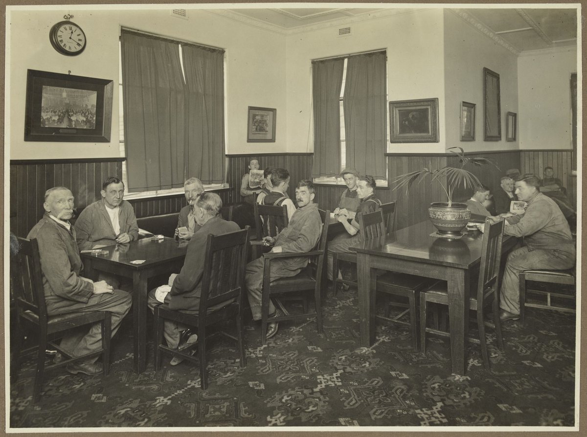 Male employees of Bryant & May, Richmond, in the Men's Club Room (1920–30)