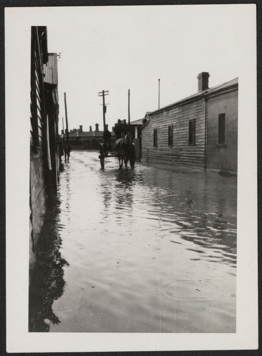 Flooded Barkly Street and some family photographs Footscray Victoria (1924)