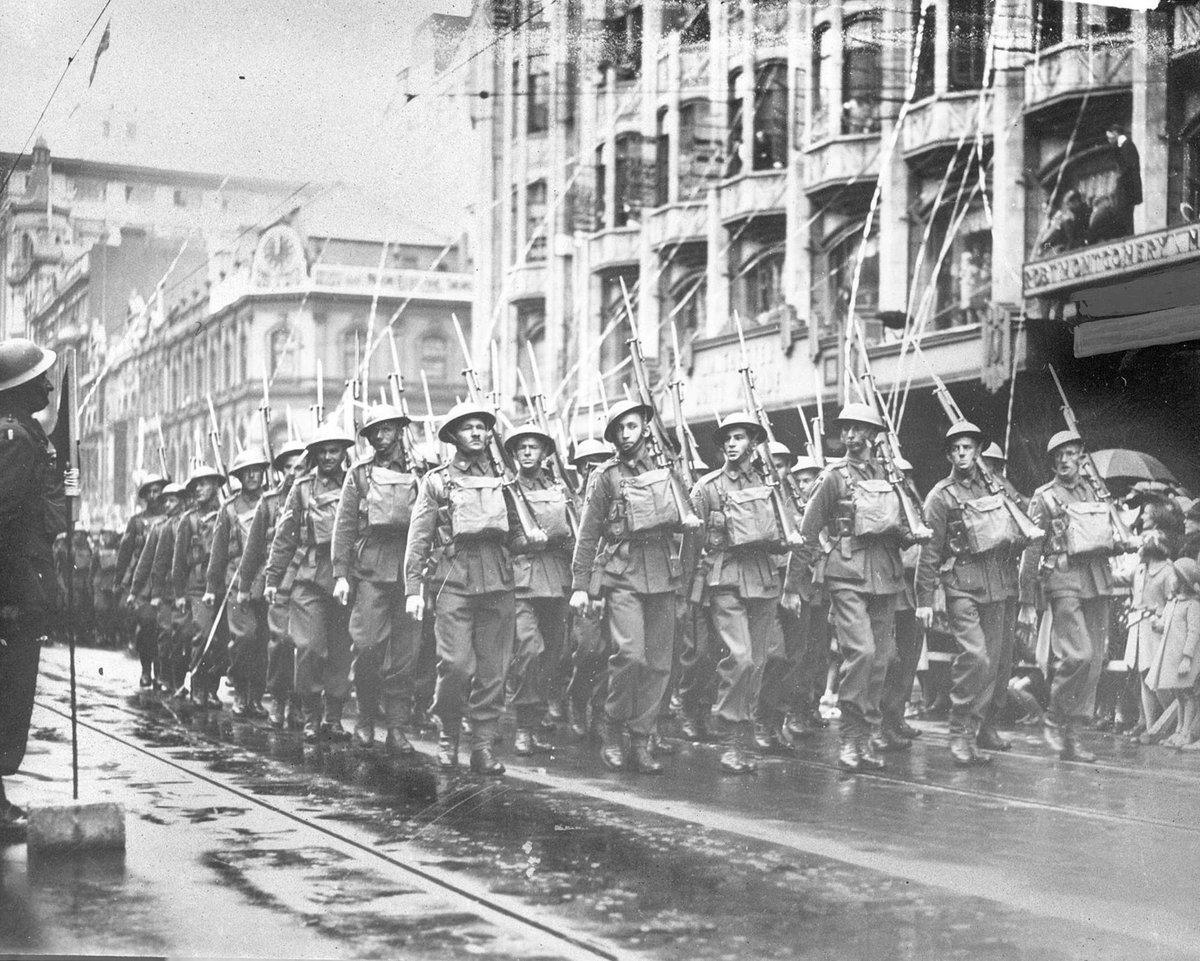 Soldiers from the A.I.F. parading down Melbourne streets, Melbourne City (c. 1941)
