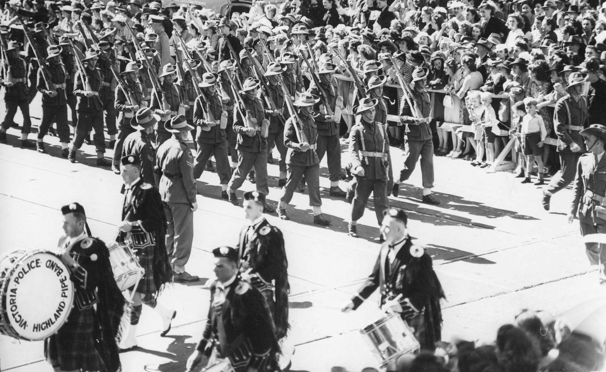 Military procession in Melbourne, near the corner of Elizabeth and Collins Streets, 1943, Melbourne City