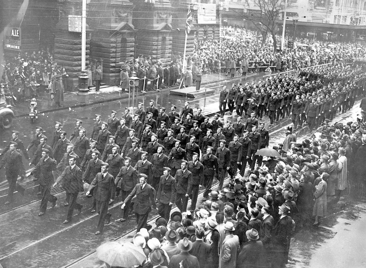 Military march in Swanston Street, Royal Australian Air Force passing saluting base, Melbourne City (1938–44)