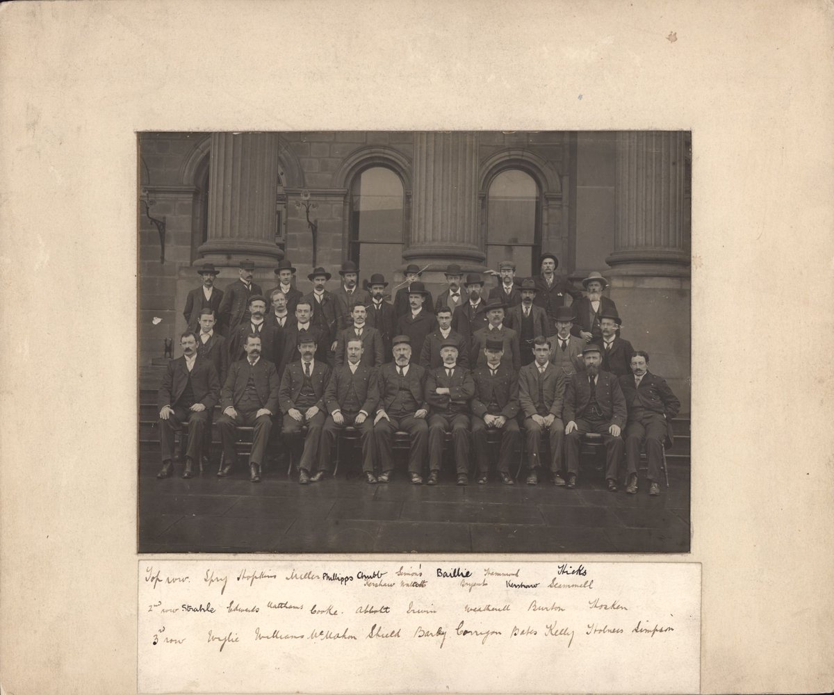 Staff of Melbourne Public Library seated in front of library, Swanston Street, Melbourne, Victoria, Melbourne City (1896–98)