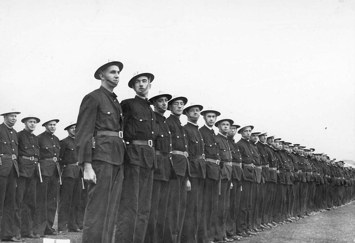 Fire fighters from the Camberwell district on parade during World War II (c. 1942)