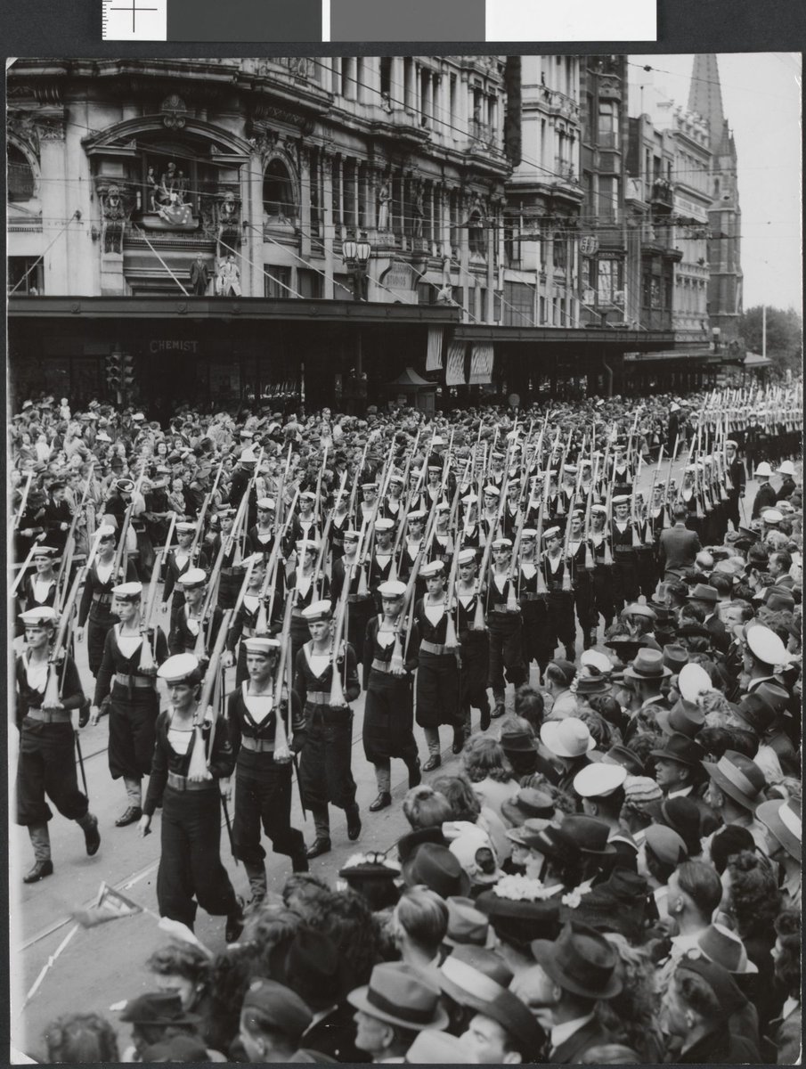 Australian sailors march up Swanston Street near Collins Street corner, Melbourne City (1946–49)