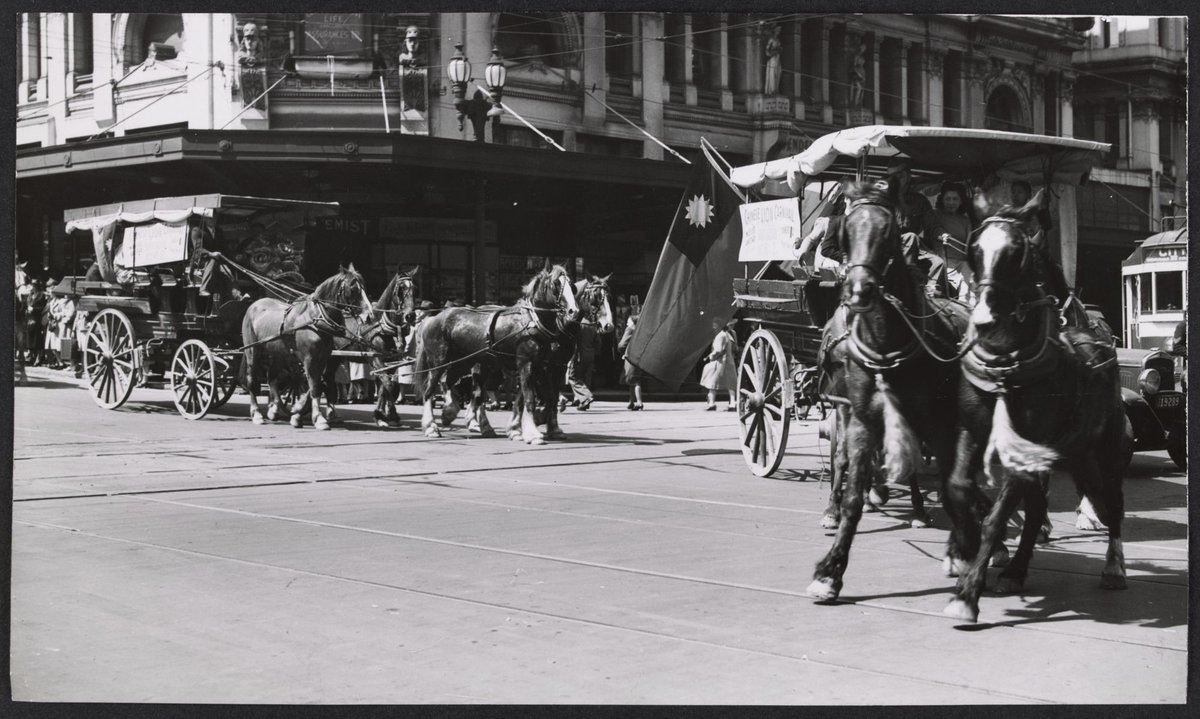 Chinese lion and drays in city of Melbourne to promote the Chinese Lion Carnival, Melbourne City (c. 1943)
