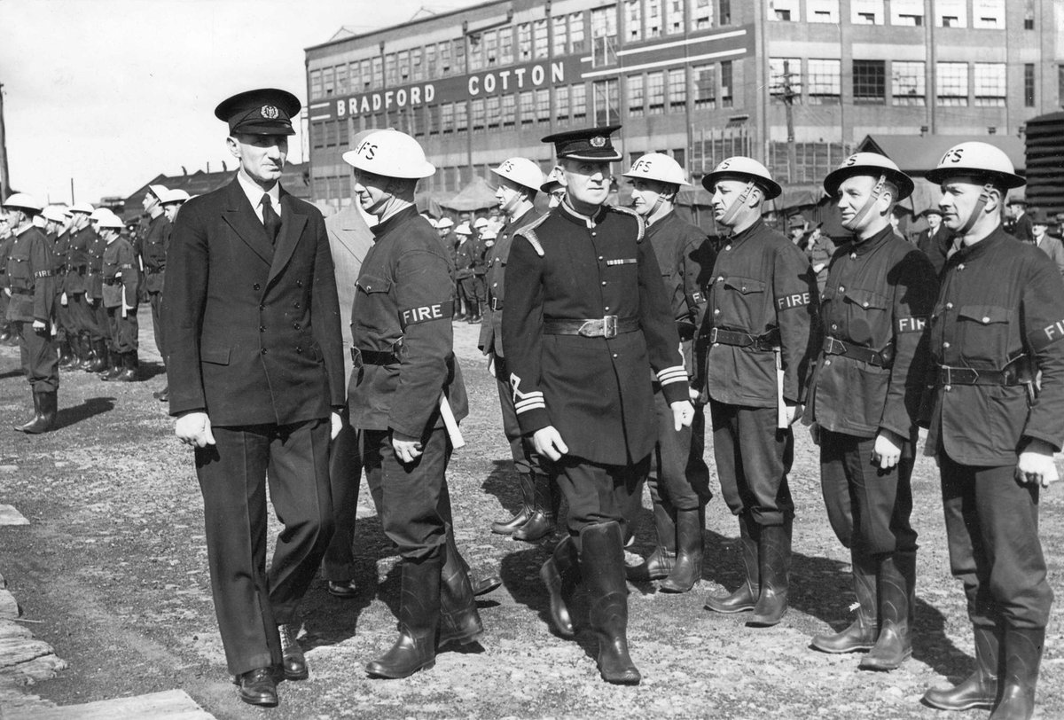 Chief Fire Officer James Kent inspecting ranked Footscray Auxiliary Firemen during World War II (c. 1942)