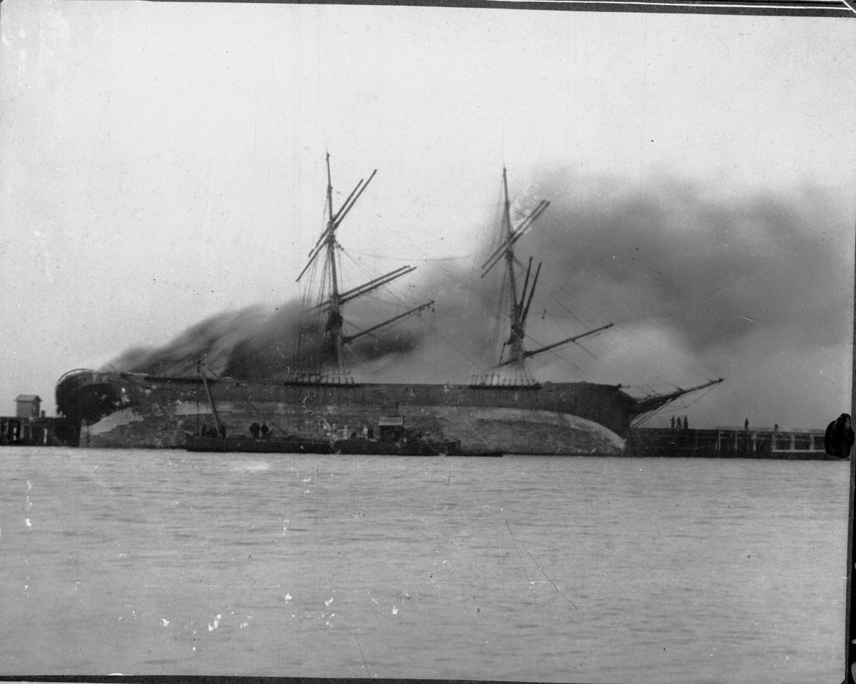1675 ton American ship Hilaria : On fire at Town Pier Port Melbourne. 1895
