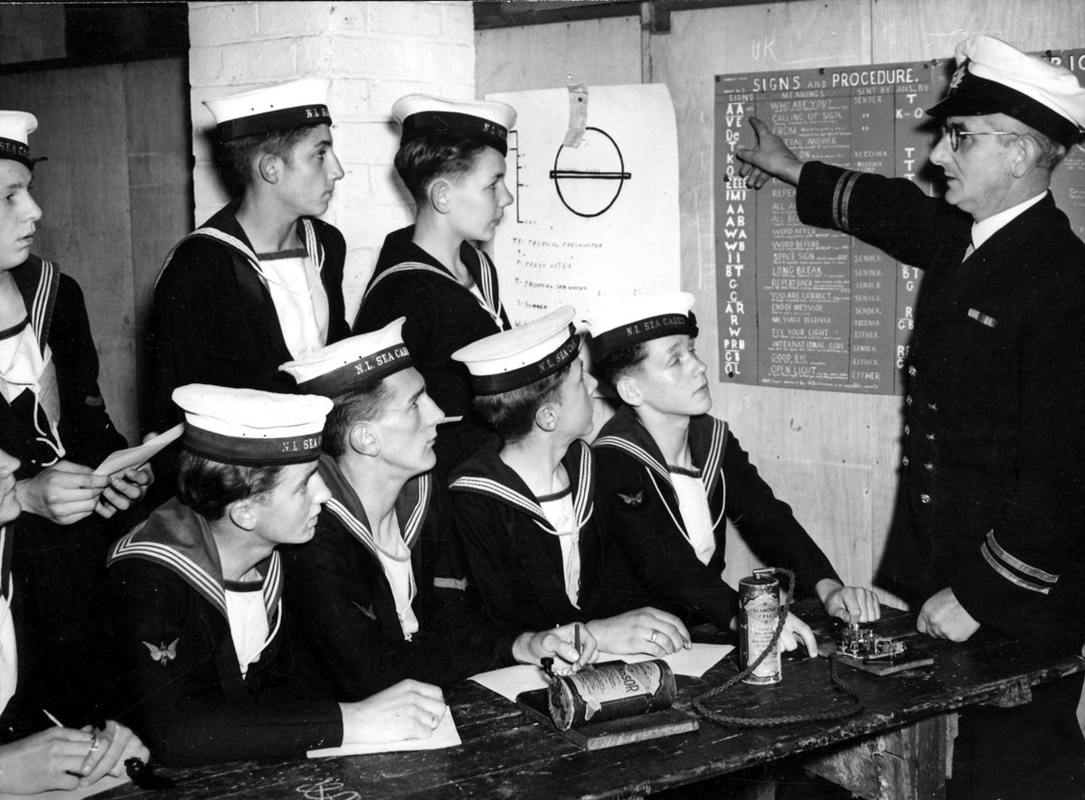 Navy League Sea Cadets of Melbourne Branch receiving instructions in sending messages in morse (c. 1943)