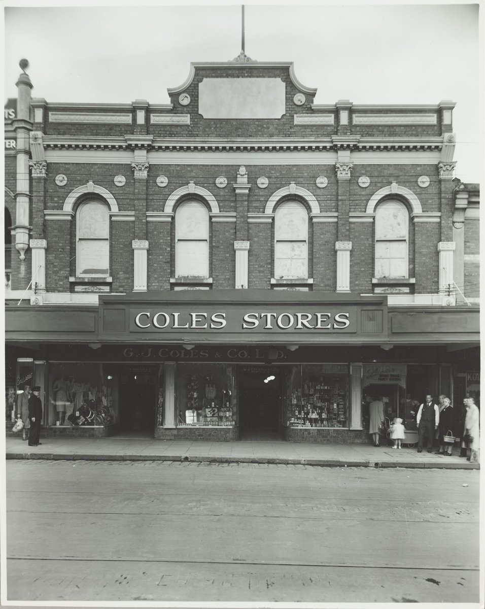 Exterior of Coles store with merchandise displayed in the windows priced from 7d. Coburg Store No. 21 (1947)