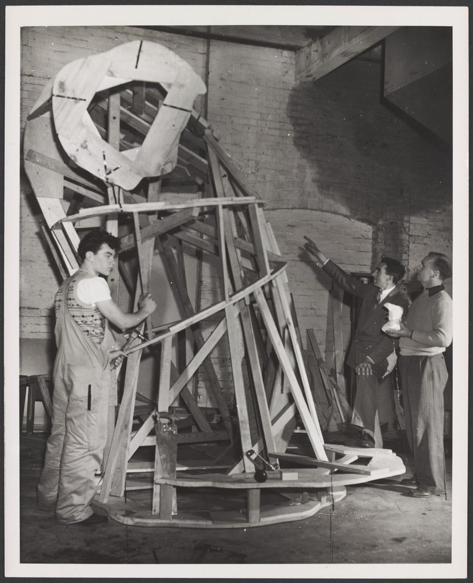 Men working on the construction of the Christmas Facade of Coles Bourke Street Store No. 12, Melbourne City (1954)
