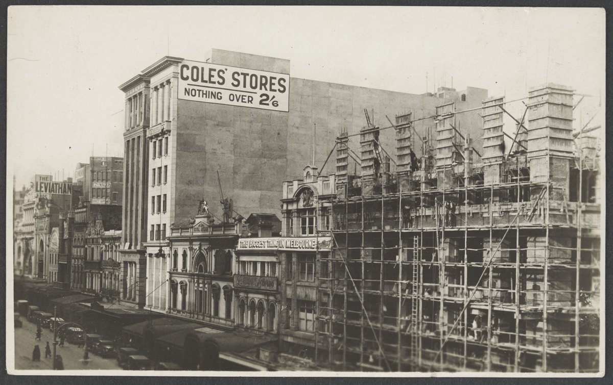 Elevated view along Bourke Street showing construction site beside Coles Variety Store in Deva House Melbourne Store No. 4, Melbourne City (1924–34)
