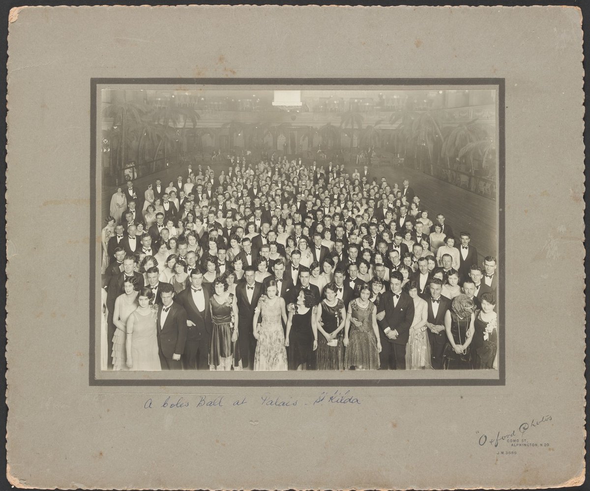 Elevated view of a large group of Coles Staff Ball at the Palais St Kilda (1930)