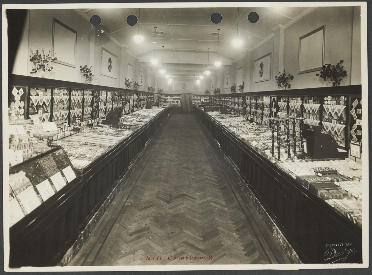 Interior of store showing wood panelled counters displaying jewellery in Camberwell Coles Variety Store No. 11 (1928)