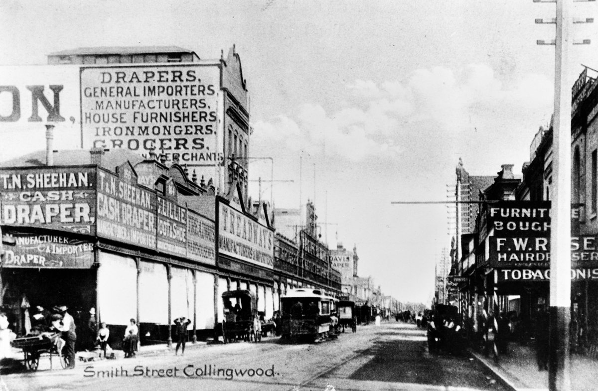 Smith Street, Collingwood, includes businesses, horse-drawn vehicles, cable car and pedestrians (1906–14)