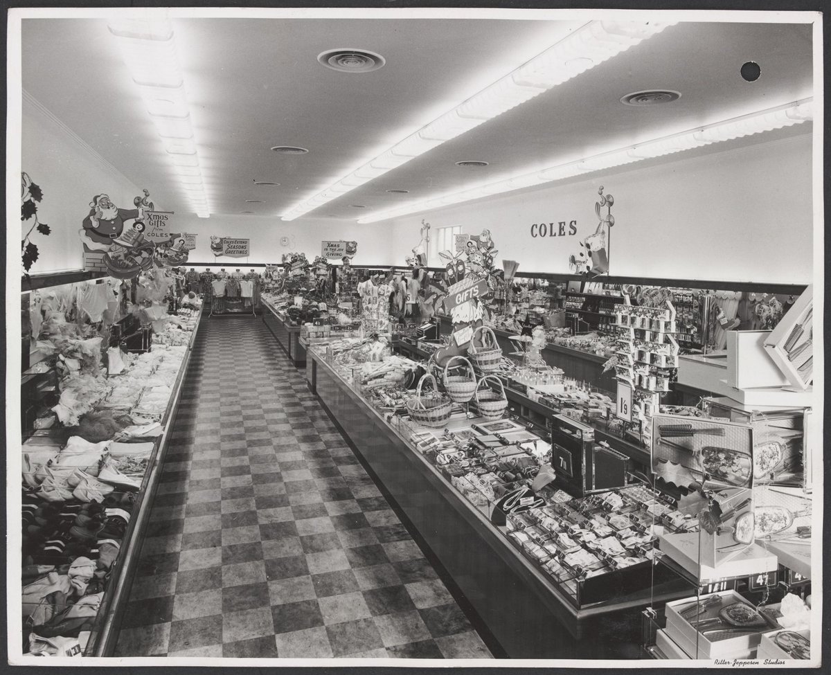 Interior view back to front-merchandise and Christmas decorations Mentone Store No. 182 (1953)
