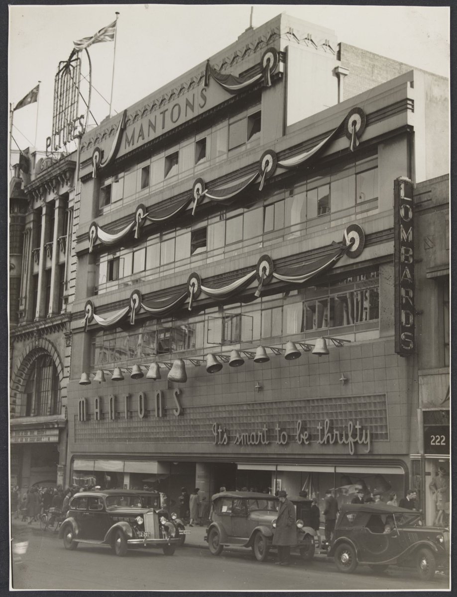 Mantons shopfront, Bourke Street, six storey art deco building decorations celebrating Victory in the Pacific, Melbourne City (1945)