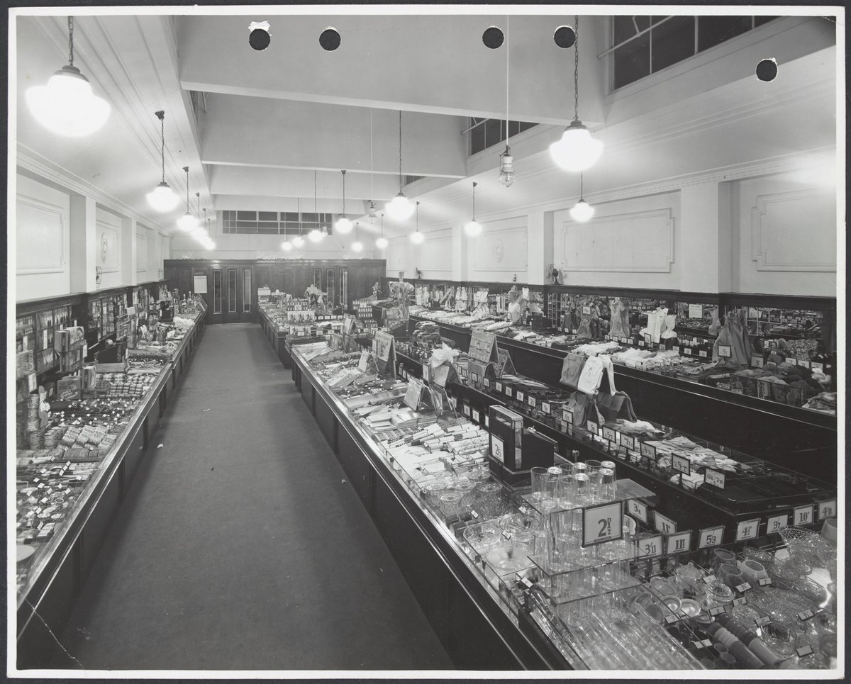 Elevated view of interior showing wide variety of goods on display counters in Coles Carnegie Store No. 50 (1947)
