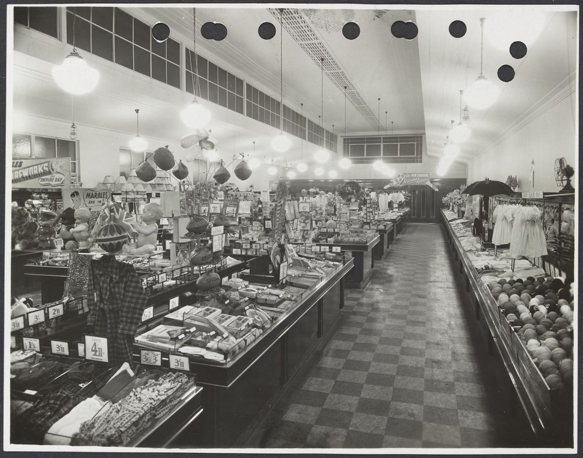 Elevated view of interior showing display counters of children's clothes wool and gifts in Coles Collingwood Store No. 1 (1936)