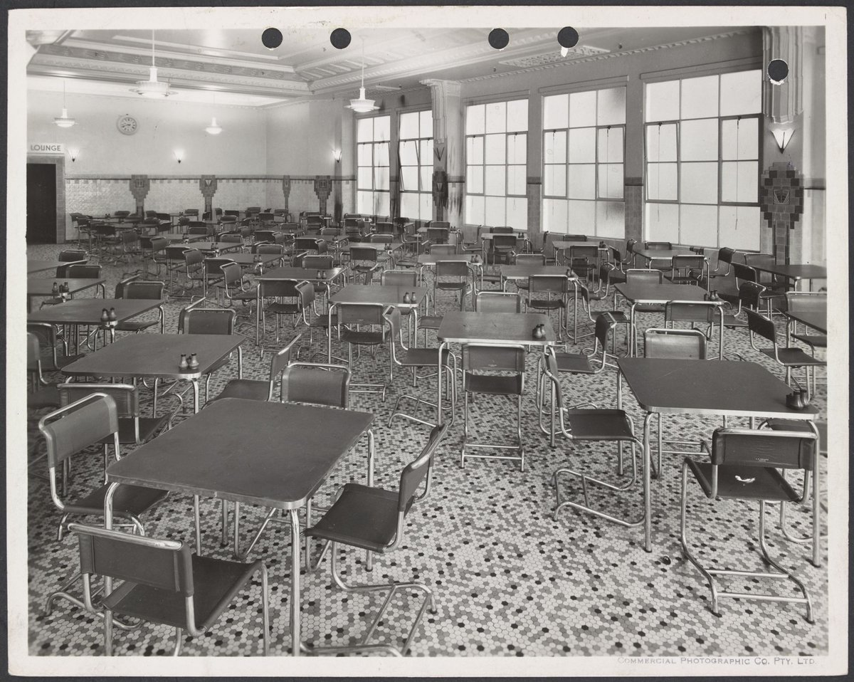 Elevated view of empty canteen with tables chairs and tiled floor in Coles Bourke Street Store No. 12, Melbourne City (1939)