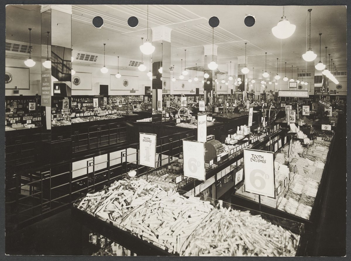 Interior of Buckley's store showing counters in foreground stacked with toothbrushes and prices prominently displayed in Melbourne Coles Variety Store No. 4 (1934)