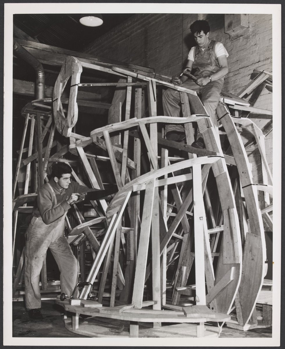 Men working on the construction of the Christmas Facade of Coles Bourke Street Store No. 12, Melbourne City (1954)
