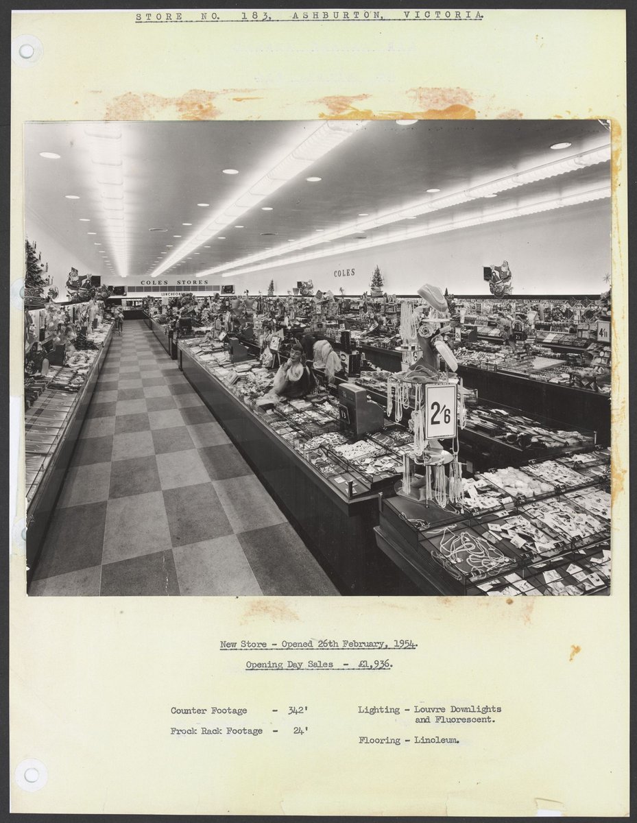 Interior showing tables of merchandise-jewellery in foreground High Street Ashburton Store No. 183 (1950s)