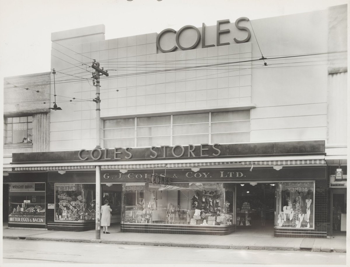 View from street of facade of shop showing display windows and signage of Coles St. Kilda Store No. 64, St Kilda (1939–49)