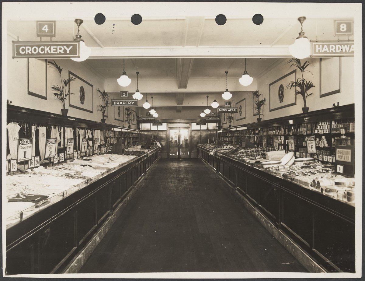 Wood panelled counters and decorated walls in Prahran Coles Variety Store No. 2 (1932)