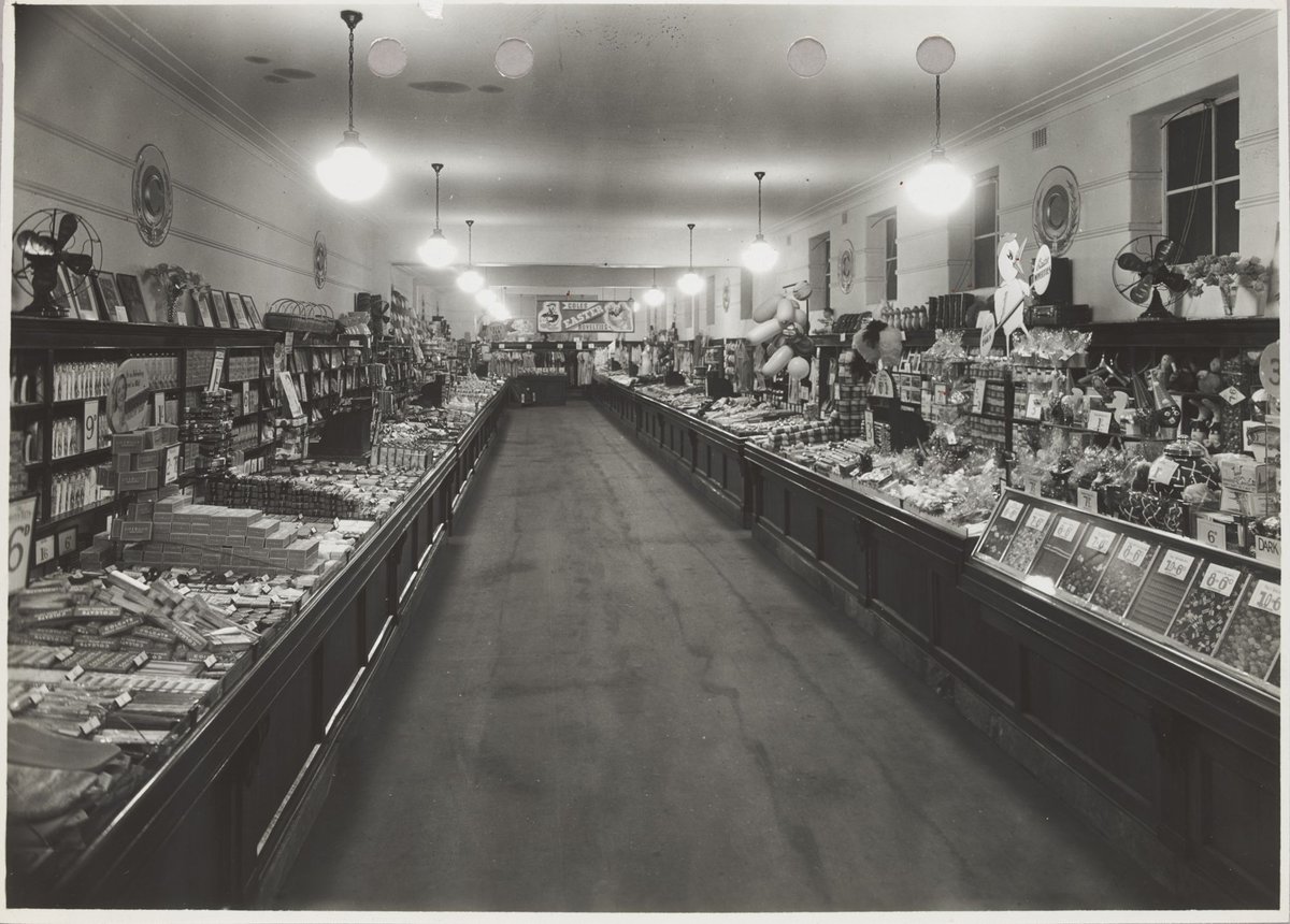 Interior of Coles Swan Street store showing Colgate toothpaste for 6d. and loose confectionary bought by weight Richmond Store No. 19 (1940–50)