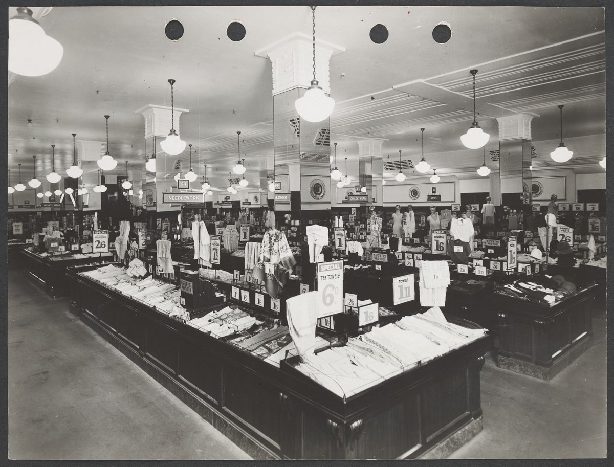 Interior of Buckley's store showing counters of manchester and clothing with prices prominently displayed in Melbourne Coles Variety Store No. 4 (1934)