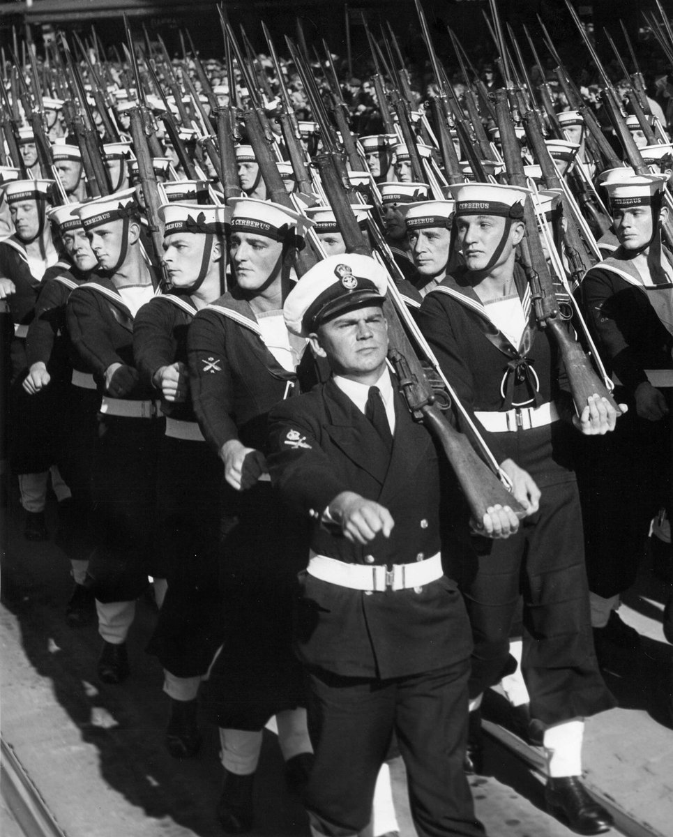 Men of the H.M.A.S. Cerberus marching up Swanston Street for Coral Sea Battle march, Melbourne City (1950–54)