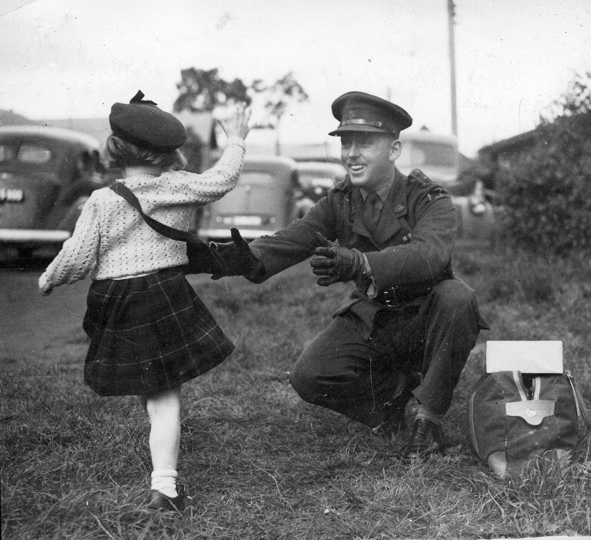 Lieut. T. Rawley, who returned to Melbourne yesterday after spending 4 [and a half] years in a P.O.W. camp, was welcomed by his niece, Judith Longden, to whom he was only a legend (c. 1945)