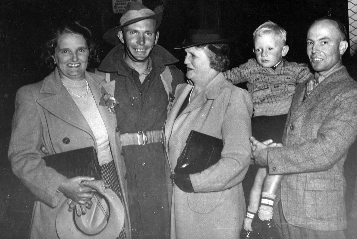 Bombadier Gibson with his sister, mother and brother in law in Melbourne on his arrival from [the] Middle East (c. 1942)
