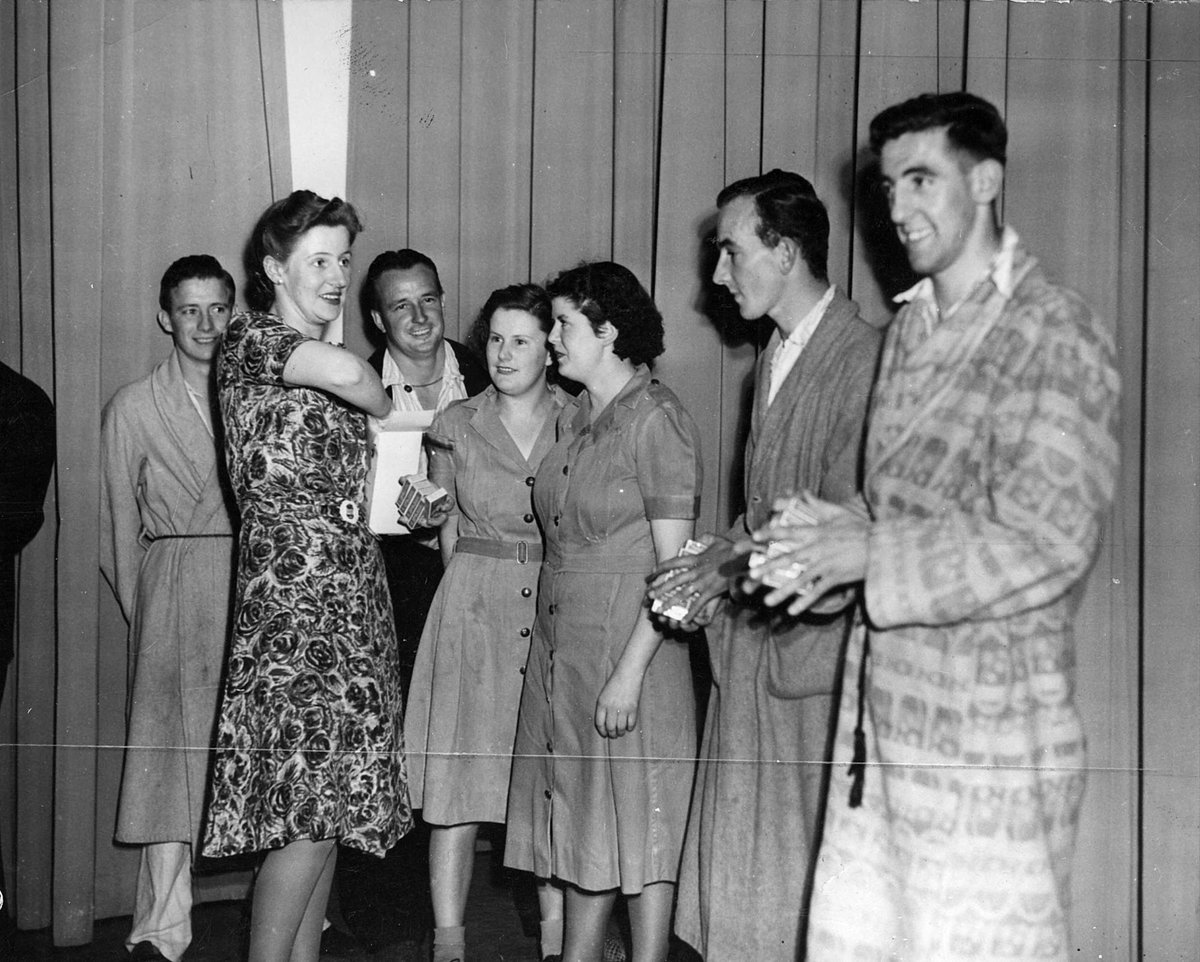 Heidelberg Military Hospital, Miss Kathleen Campbell presenting prizes on stage (c. 1943)