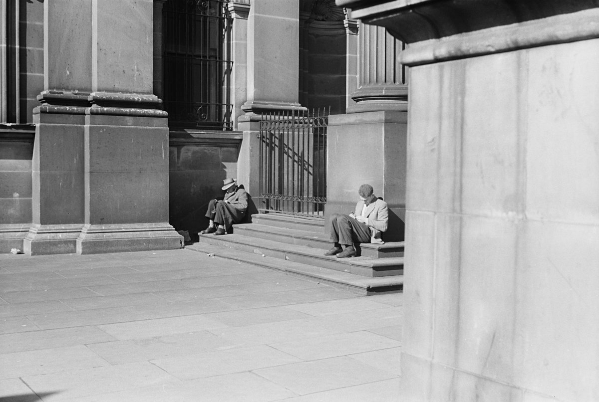 Two men on steps of State Library of Victoria, Melbourne, Melbourne City (1954)