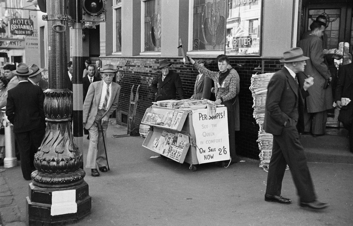 Newspaper stand selling periscopes in Melbourne during the royal tour of 1954
