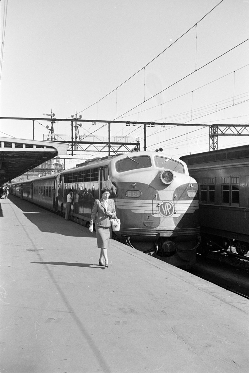 Victorian Railways country train at platform in station, Melbourne, Victoria (1953)