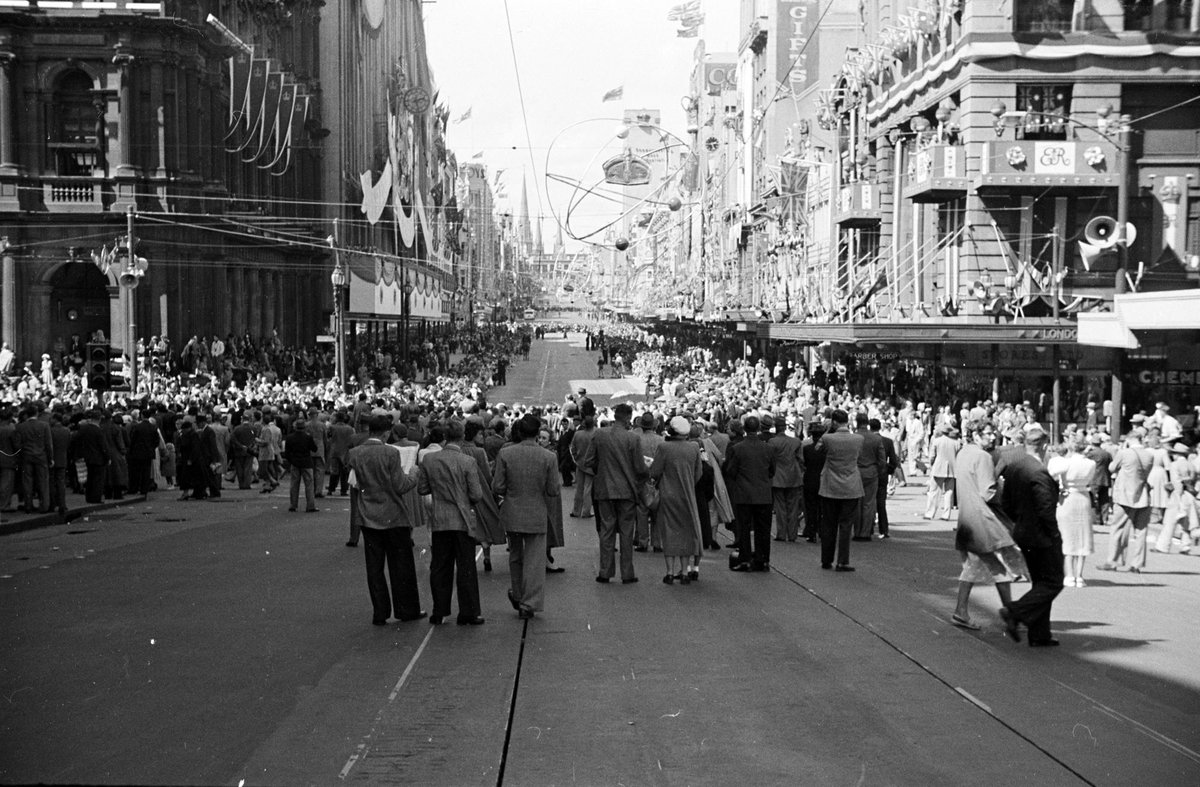 Crowd gathered in Bourke Street during royal tour of 1954, Melbourne City