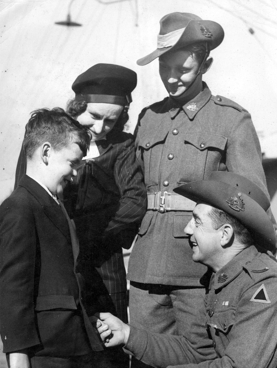 Gunner G. Mallet of Ringwood [Vic.] with his wife & two sons Pte. F. J. Mallet and Brian (c. 1945)