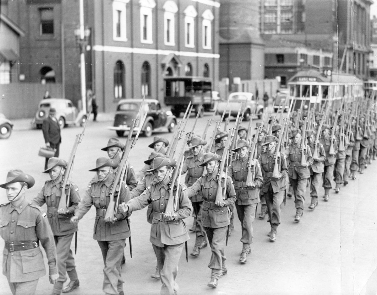 4th and 15th Infantry Brigades march through city street in Melbourne (c. 1944)