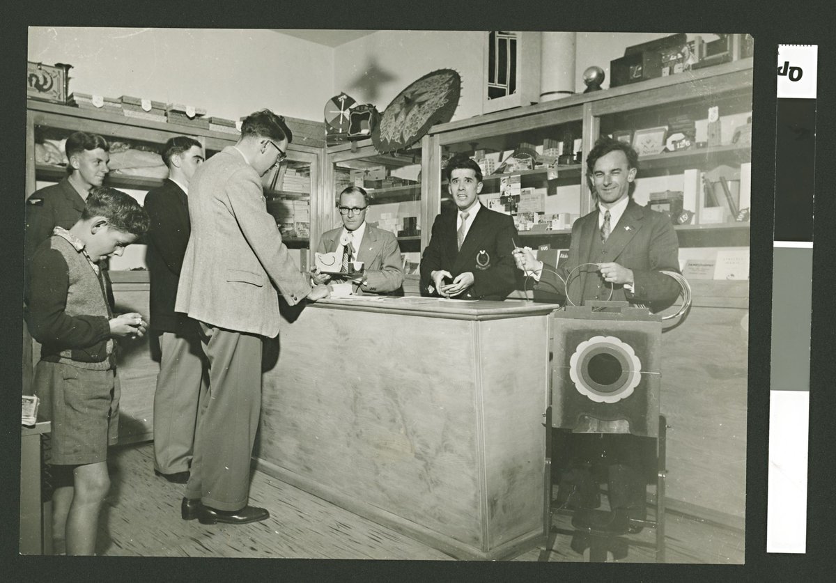 Group of men and a boy in a magic shop [Bernard's Magic Shop, Melbourne?] (1940–54)
