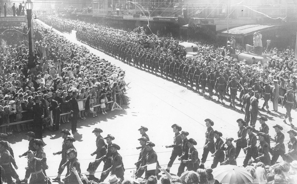 Military procession in Melbourne, near the corner of Elizabeth and Collins Streets, 1943, Melbourne City