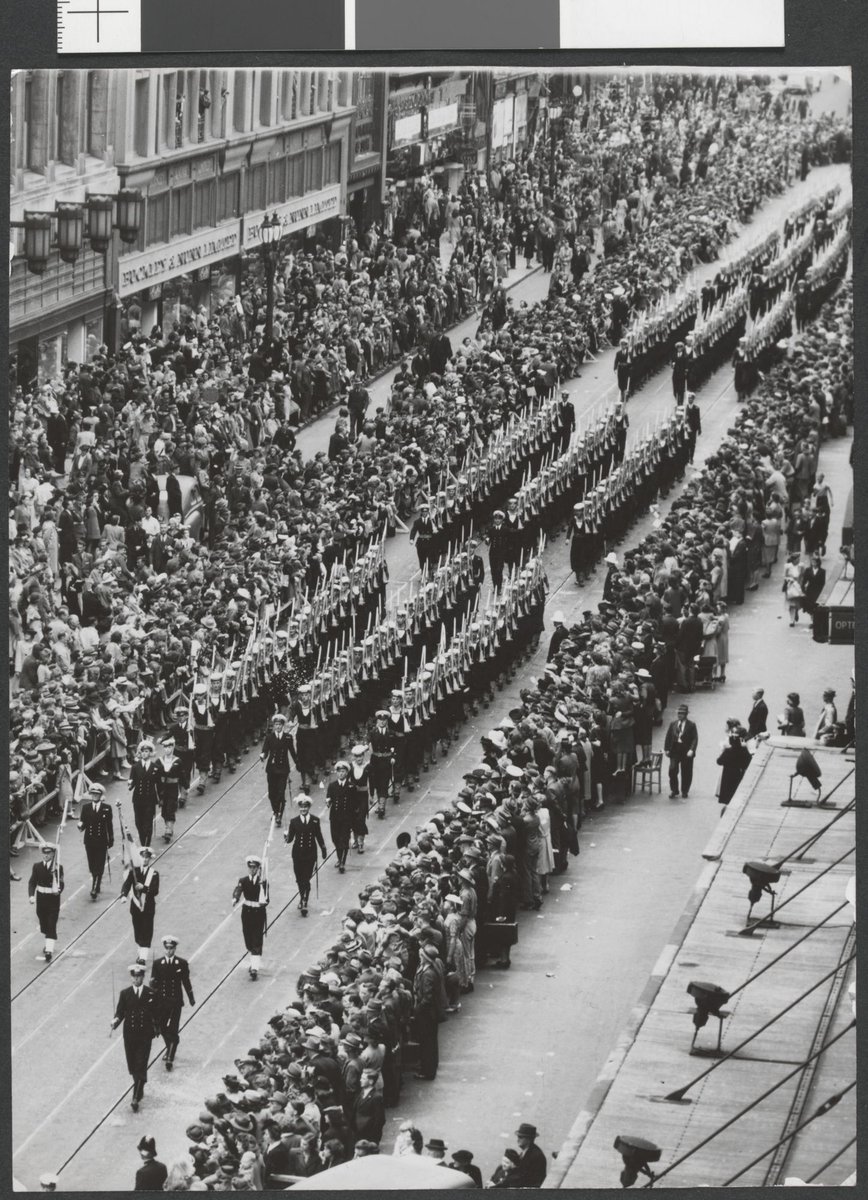 Overhead view of naval personnel marching along Bourke Street, Melbourne City (1946–49)