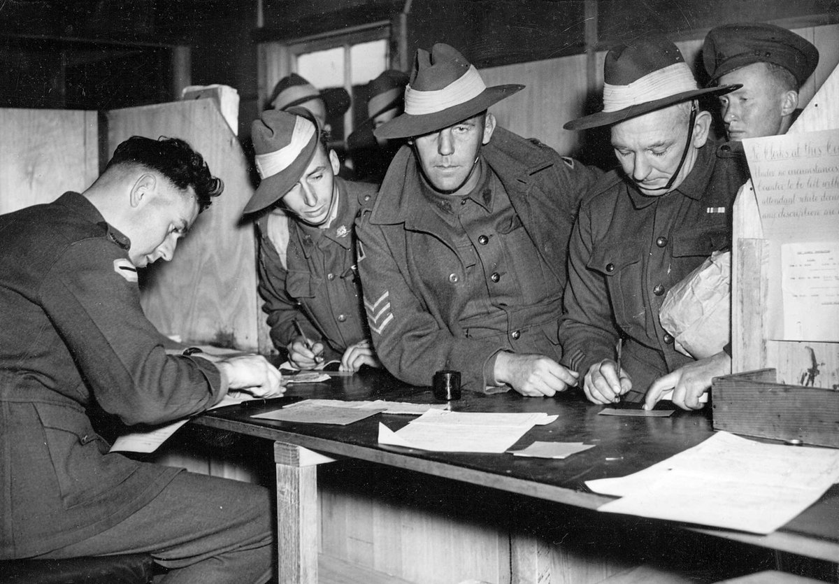 Dischargees signing papers at S.D.D. Royal Park, Parkville (1941–47)