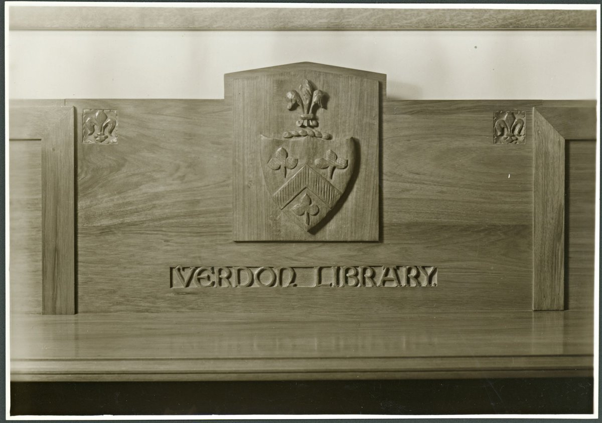 Detailed view of woodcarving of Trinity College crest at Verdon Library, Melbourne University, Parkville, Victoria (1920–48)