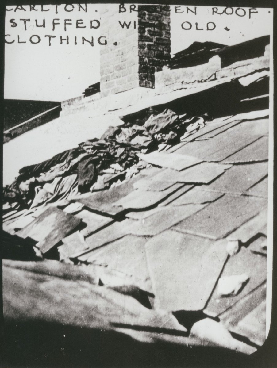 Carlton. Broken roof stuffed with old clothing (c. 1935)