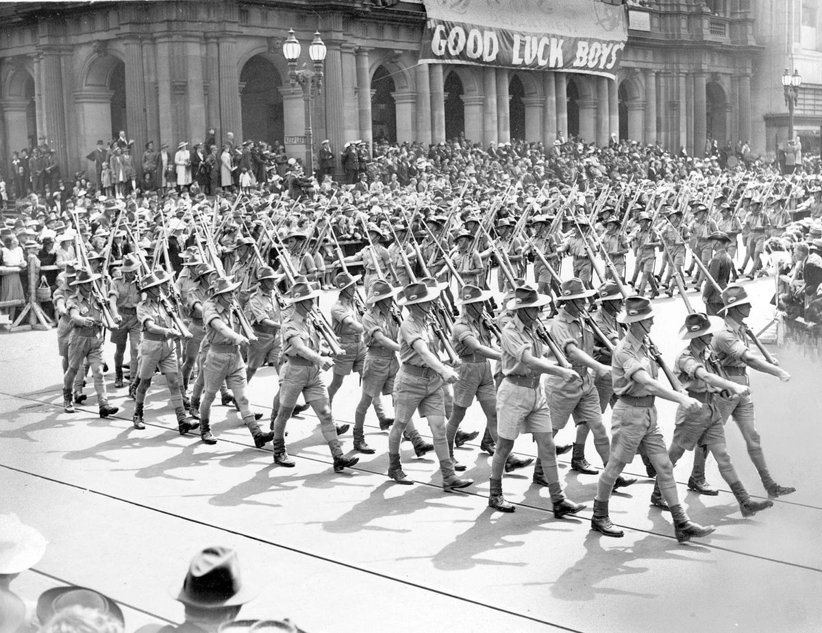 Military march in Melbourne, soldiers wearing tropical uniform, Melbourne City (c. 1941)
