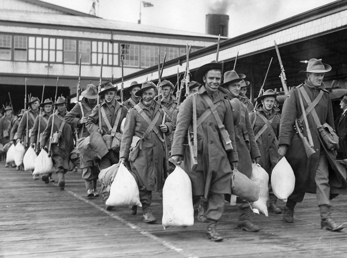 Men of the 2nd contingent of the 2nd A.I.F. walk the deck before embarking at Port Melbourne (c. 1940)